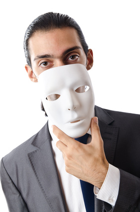 Industrial espionage concept with masked businessman