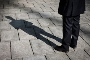 Shadow of a businessman standing